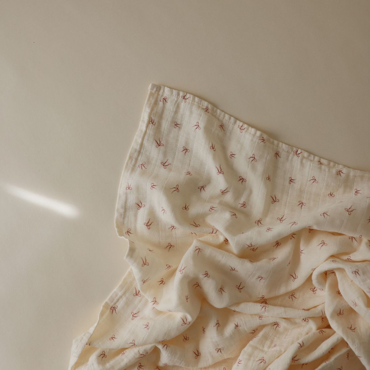 Mushie Swaddle Bows